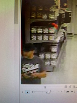 Suspect wearing grey t-shirt, black cap, shorts and sandals 
