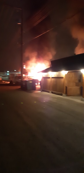 Photo of Sunshine Inn parking lot fire.