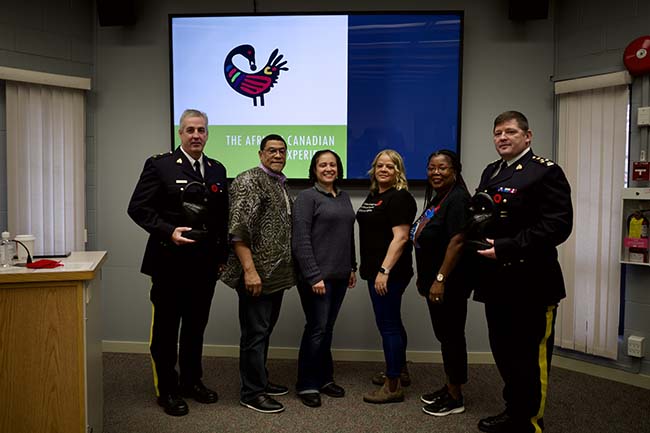 Inspector David Bristow, Sergeant Craig Smith, Inspector Veronica Fox, Shelly Braithwaite, Dana Colley-Provo and Assistant Commissioner John Brewer. 